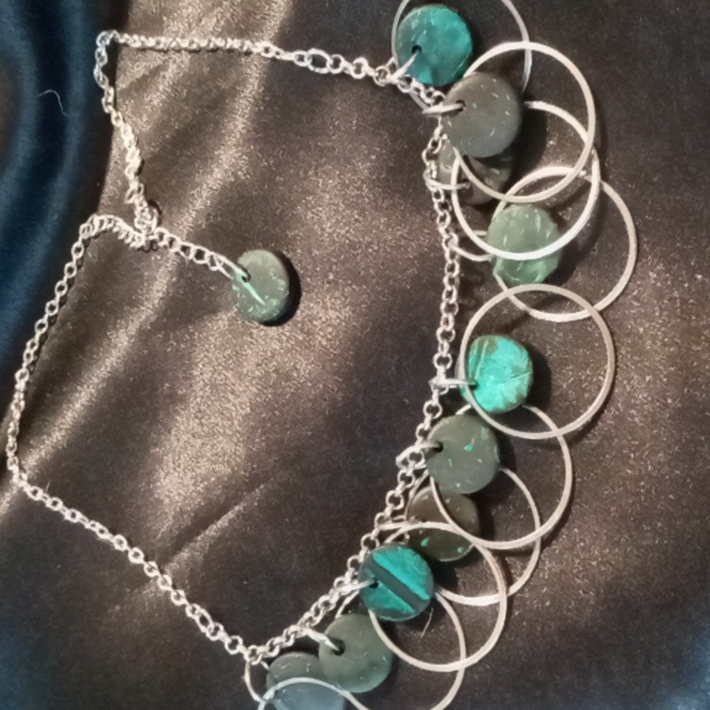 Bib collar statement necklace beaded on a rolo chain .